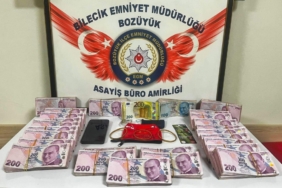 11haber-429393-85o-bin-tl-dolandiran-supheliyi-emniyet-yakaladi-0.jpg